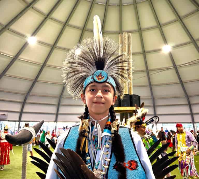 Medicine Hat 3 Young Indigenous dancer performing at the Enoch Cree Nation Powwow.